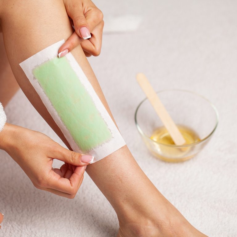 Depilation procedure with wax on the legs