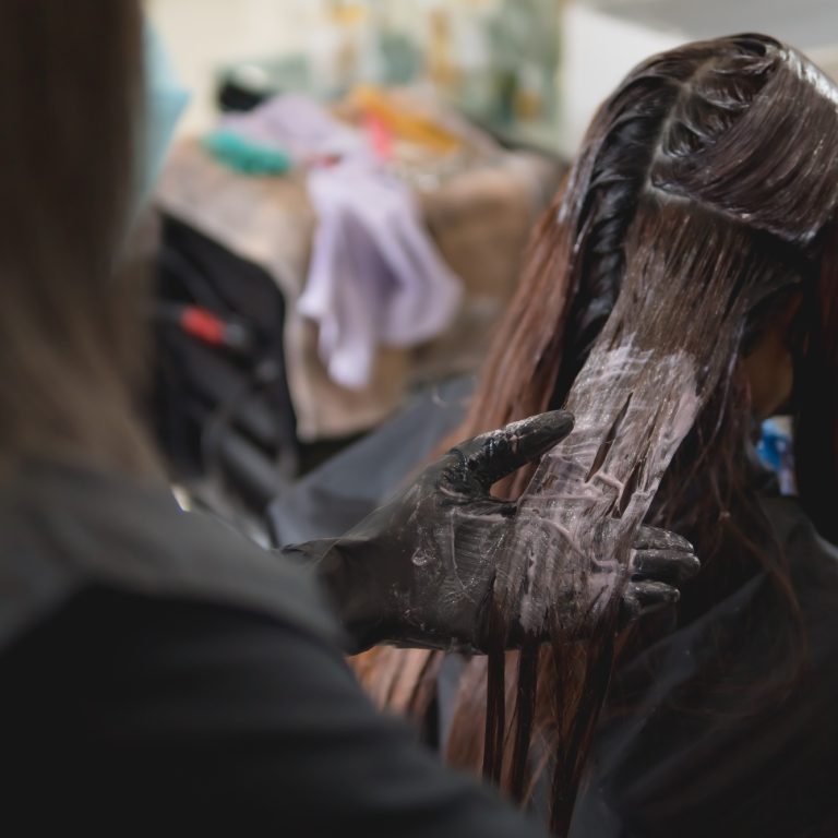 Hair coloring in a beauty salon, Asian women hair coloring in beauty salon.